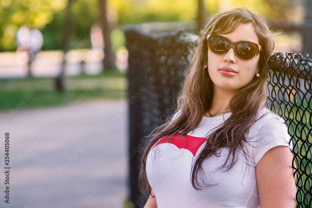 portrait of young woman in autumn park stunning radiant lovely hot gorgeous glamorous fair exquisite comely charming glass ravishing pleasing smile face skin appealing attractive portrait of young woman in autumn park stunning radiant lovely hot gorgeous glamorous fair exquisite comely charming glass ravishing pleasing smile face skin appealing attractive