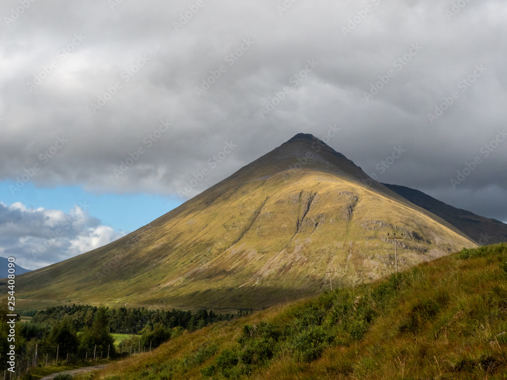 beautiful mountain with clouds above