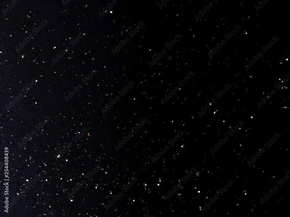 Obraz premium balck background with goolden stardust