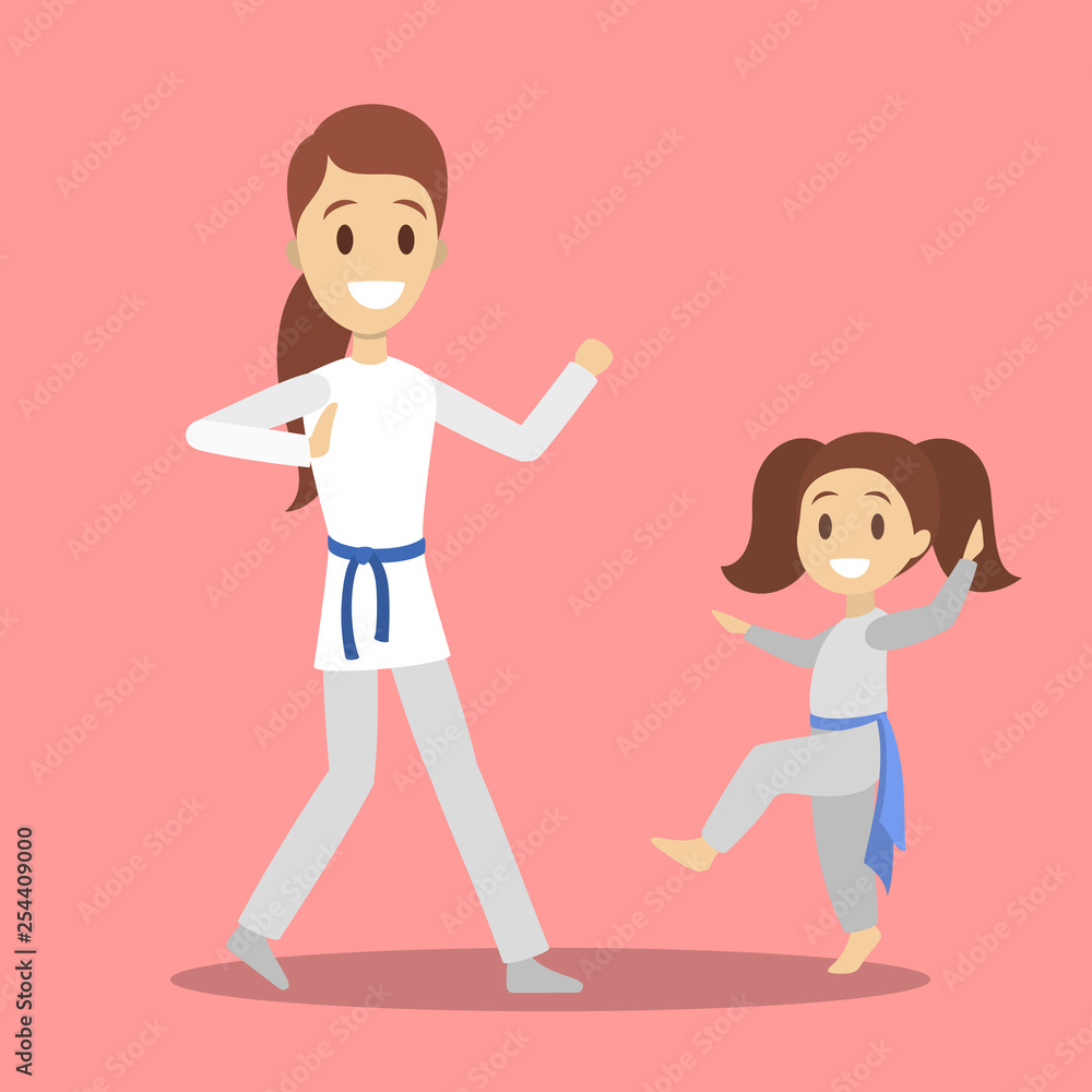 Mother and daughter in uniform training karate moves