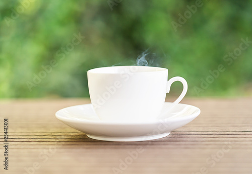 White ceramic coffee cup on table