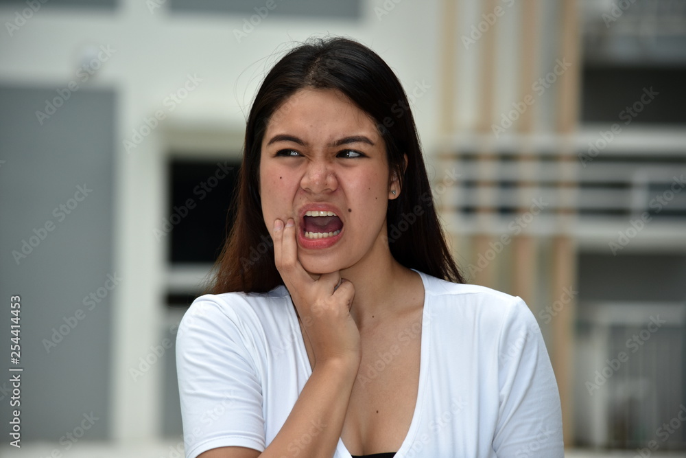 Filipina Woman With Toothache