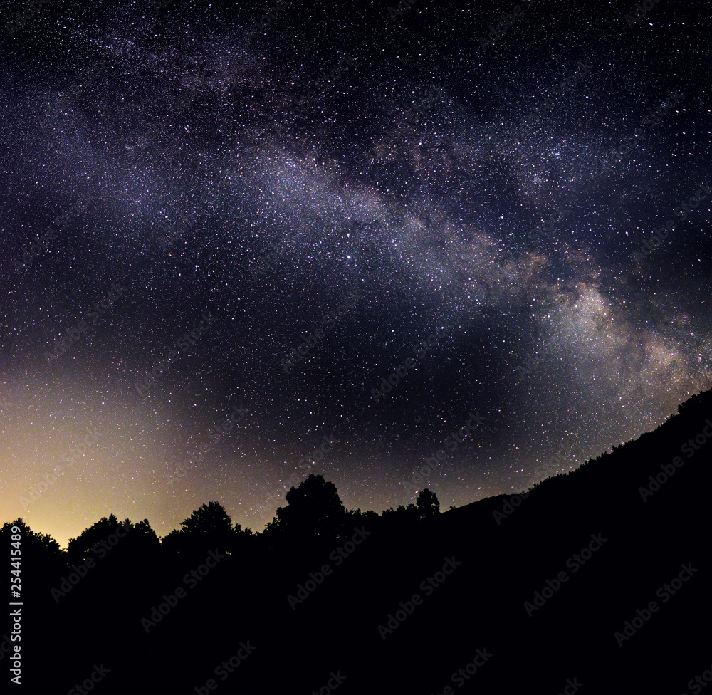 night sky with clouds and stars , milky way 