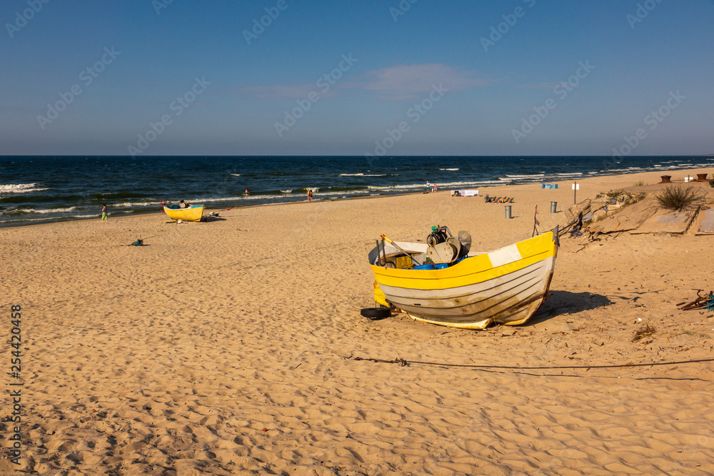 Fishing boat on the beach in Krynica Morska, Pomorskie, Poland Fishing boat on the beach in Krynica Morska, Pomorskie, Poland