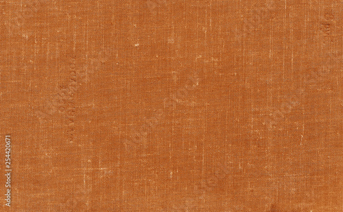 Old grungy canvas pattern with dirty spot in orange color.