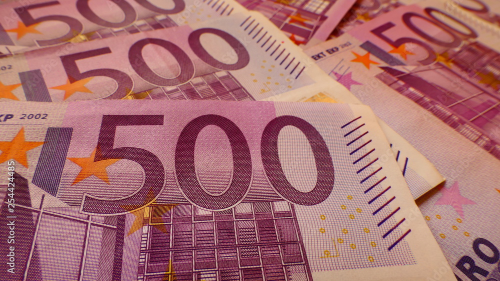 Close-up view from the frontside of multiple 500 Euro banknotes Close-up view from the frontside of multiple 500 Euro banknotes