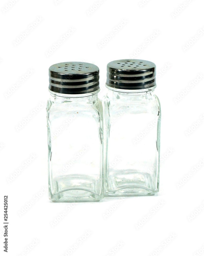 glass salt shaker pepper on white background glass salt shaker pepper on white background
