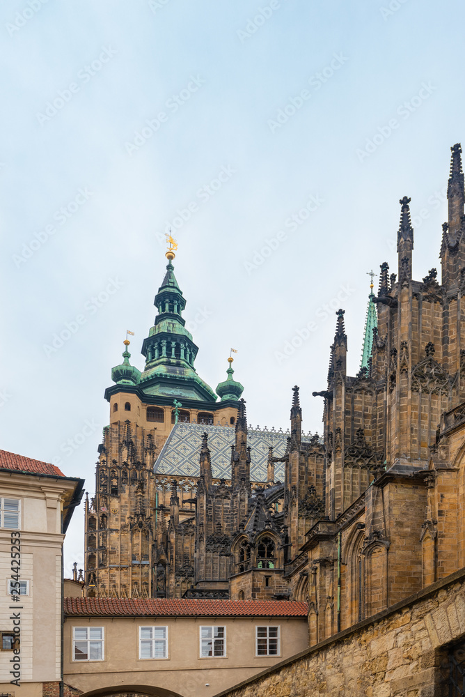 Naklejka premium Prague, Czech Republic. Gothic style rooftop decorations of St. Vitus Cathedral, part of the Prague Castle complex.