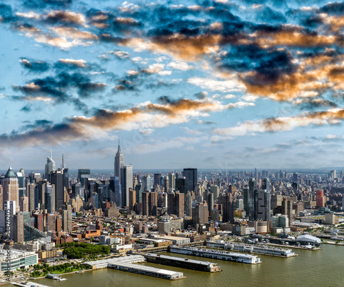Amazing aerial view of New York City. Midtown Manhattan skyline from helicopter on a sunny afternoon
