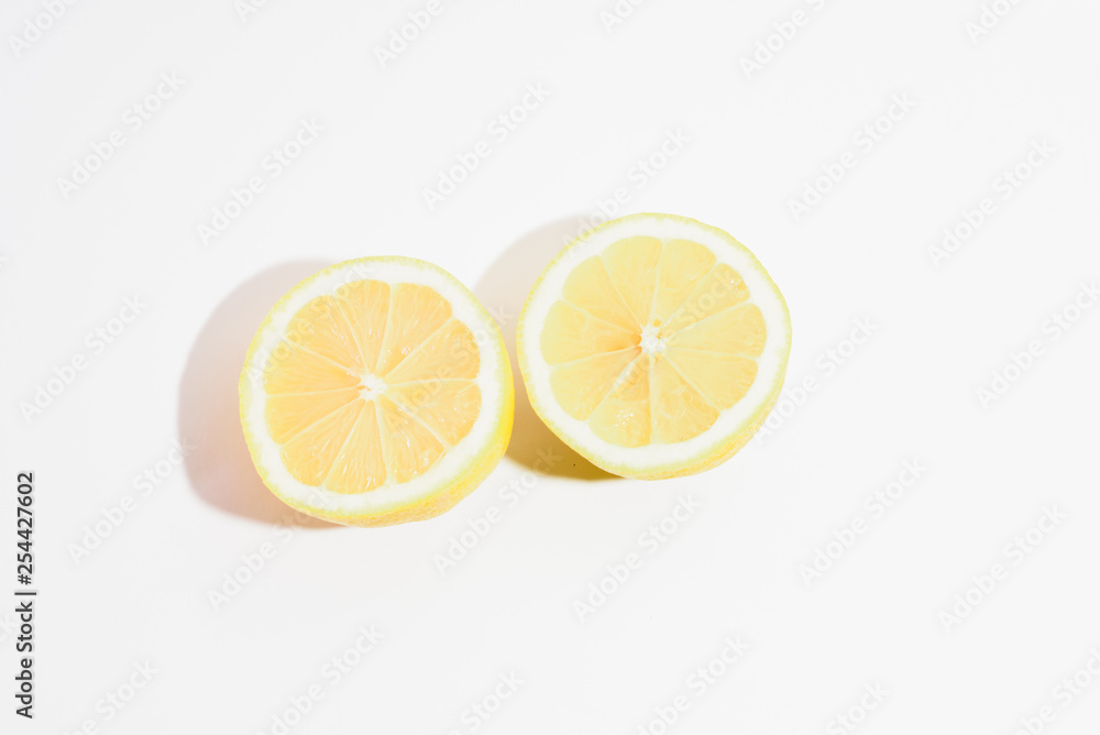 two half lemons on white background two half lemons on white background