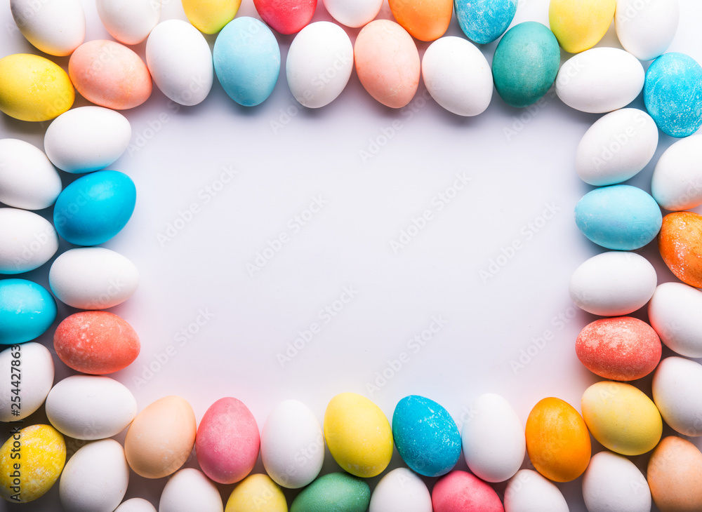 Eggs flat lay on a white background. Easter and spring composition. Copy space.