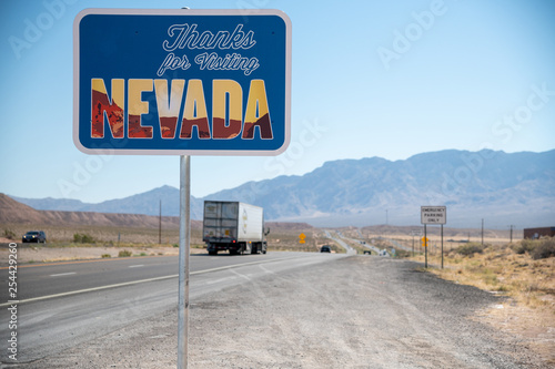 Welcome to Nevada road sign along State Route, USA