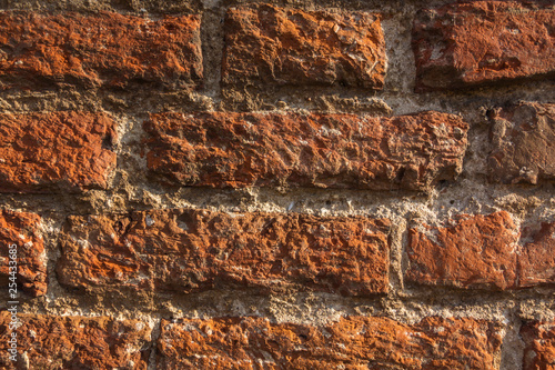 Natural background - wall with red bricks photo