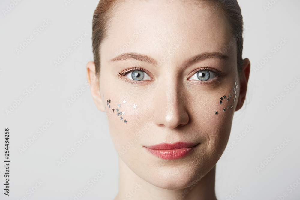 Fototapeta premium Closeup portrait of young cute girl posing on white background. Trendy and lifestyle.
