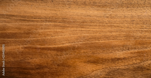 Brown wood texture with scratches.