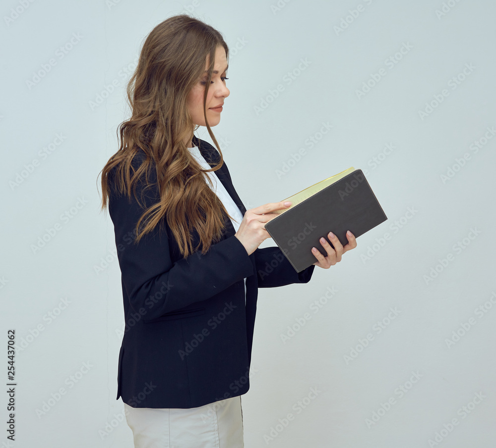 Portrait of woman teacher reading book. Portrait of woman teacher reading book.