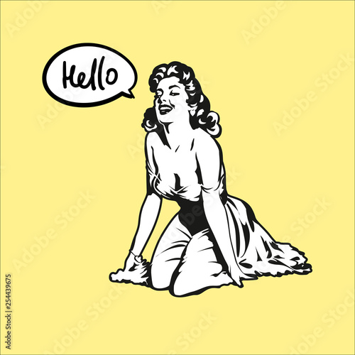 The charming girl smiles and sits on knees. Says hello