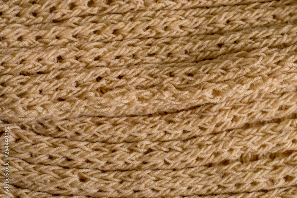 Fototapeta premium Beige knitting wool texture background