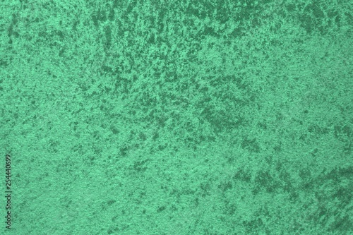 pretty shabby teal, sea-green rough painted metallic surface texture for background use.