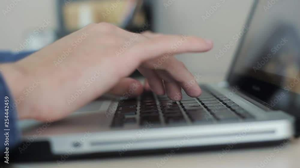 Close up male hands typing on keyboard Blurry background. Fingers on keyboard. Camera is moving Close up male hands typing on keyboard Blurry background. Fingers on keyboard. Camera is moving