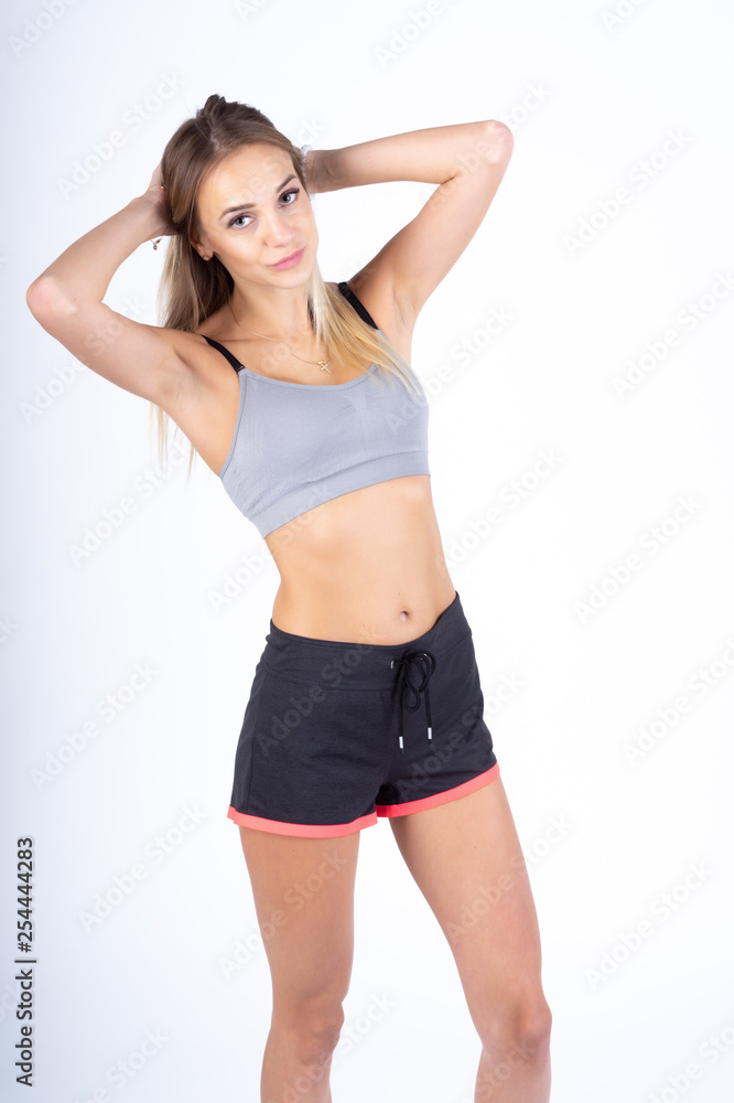 Obraz premium athletic girl standing in the studio