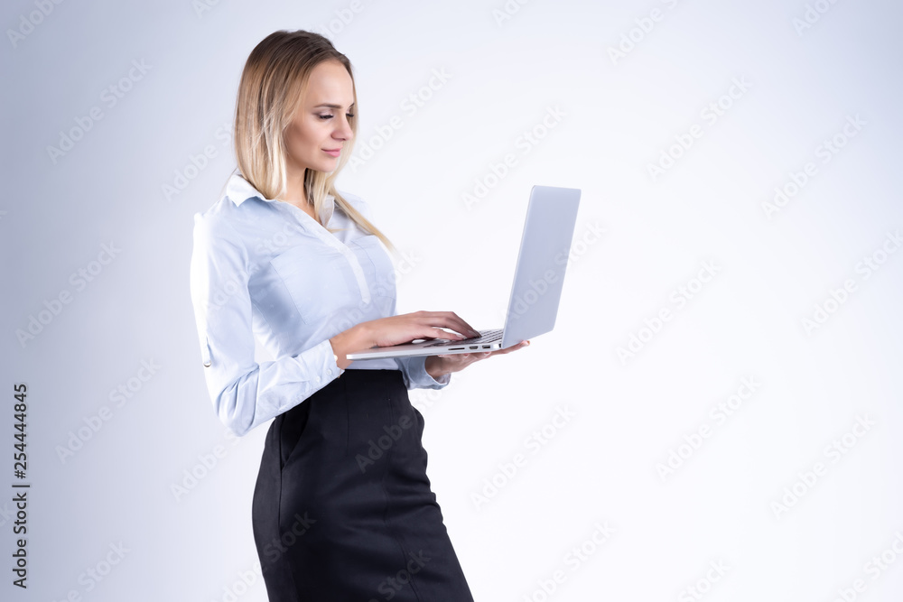 woman with laptop in hand on white background woman with laptop in hand on white background