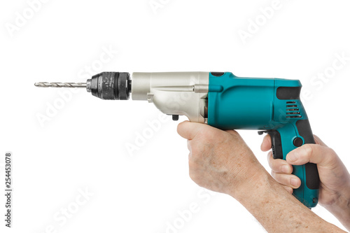 Electric drill in hands