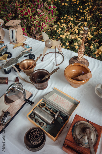 MURCIA, SPAIN. NOVEMBER 18-2018: Street flea market of old things and antiques. Stands with old  kitchenware. photo