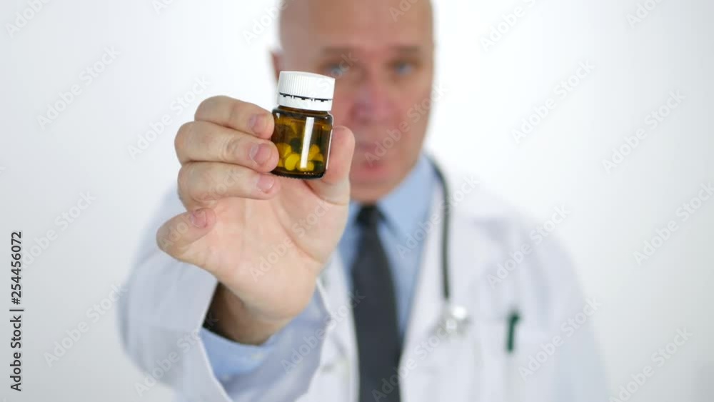 Confident Doctor in Hos[ital Recommend Pills Holding Medicine Recipient in Hand Confident Doctor in Hos[ital Recommend Pills Holding Medicine Recipient in Hand