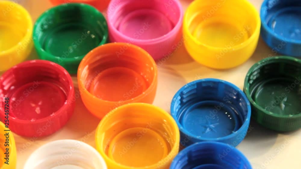 colorful plastic bottle caps. Recycling concept colorful plastic bottle caps. Recycling concept