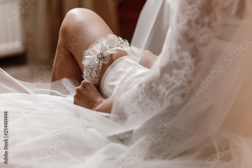 Φωτογραφία Woman wearing a garter on the leg