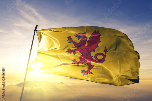 Bild auf Leinwand Somerset county of England flag waving on the top sunrise mist fog