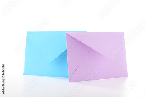 Colorful paper envelopes isolated on white background