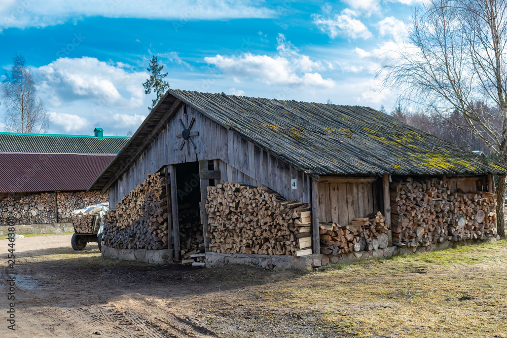 old Russian palennitsa for storing firewood for the winter old Russian palennitsa for storing firewood for the winter