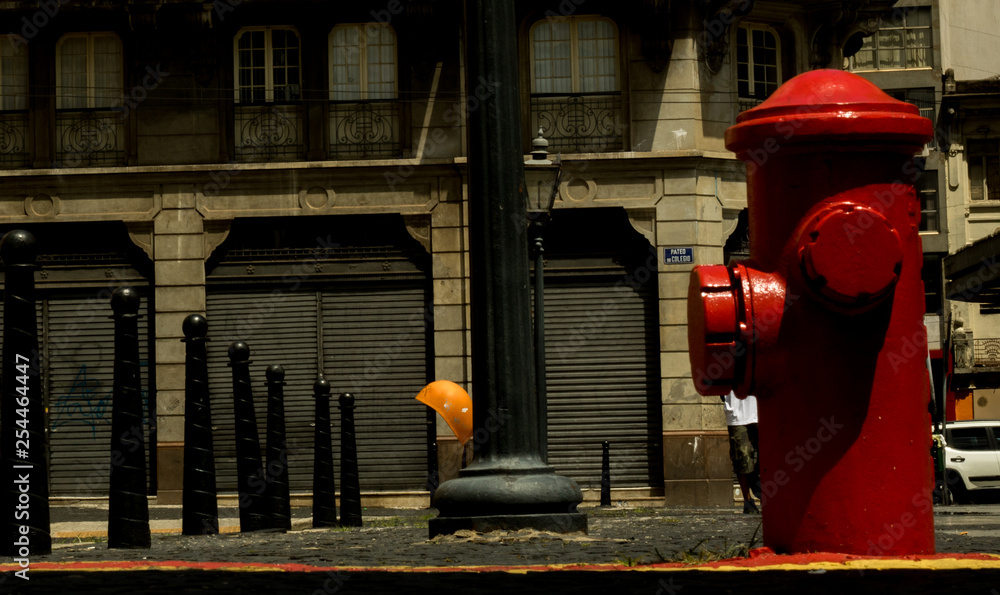 Red hydrant of street to identify the firemen in cases of accidents in the places next Red hydrant of street to identify the firemen in cases of accidents in the places next