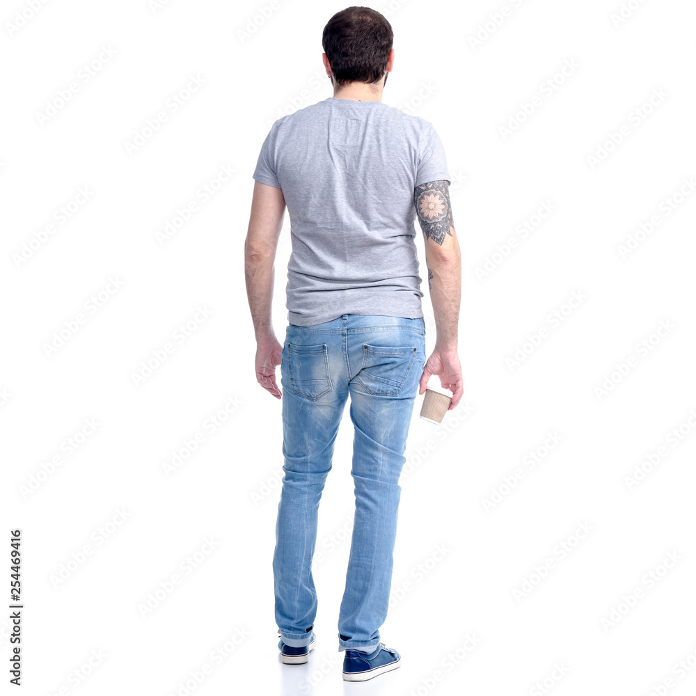 Man with cardboard cup of coffee in hand on white background isolation, back view Man with cardboard cup of coffee in hand on white background isolation, back view