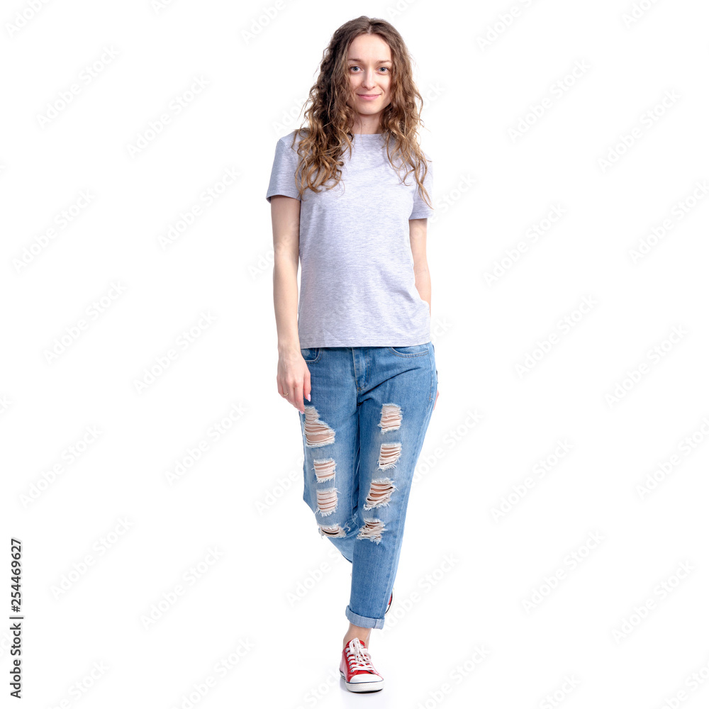Woman in jeans walking in move looking on white background isolation