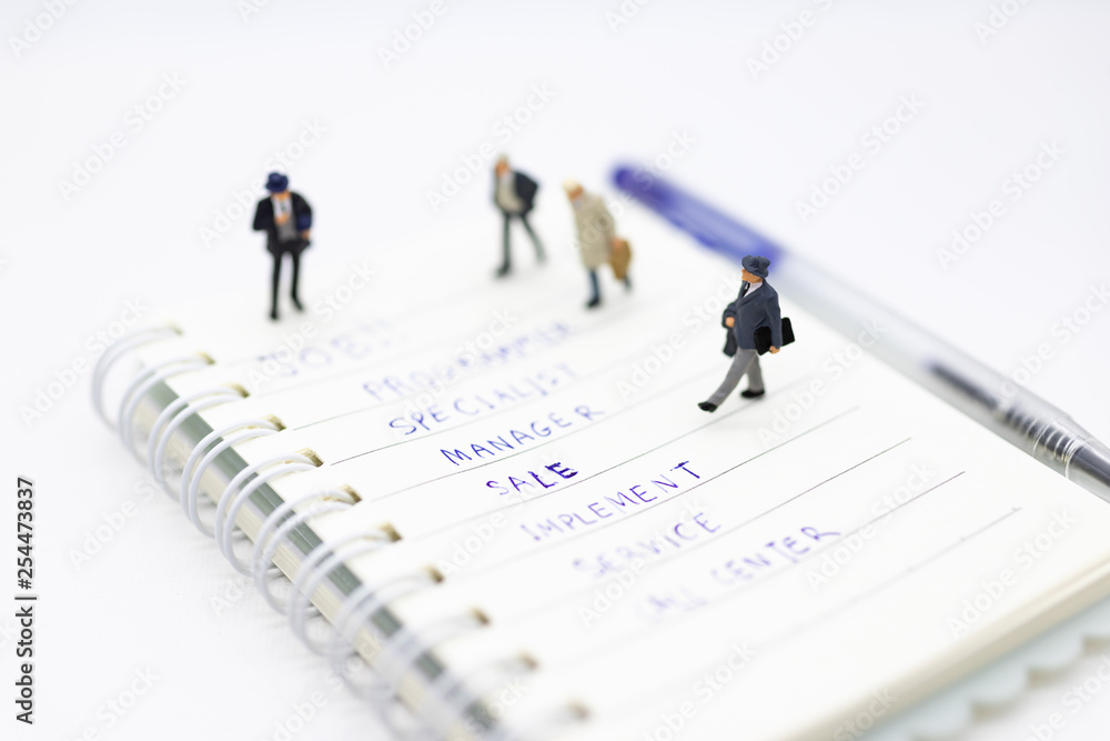 Miniature people: Supervisors look for employees for job placement, using as background Choice of the best suited employee, HR, HRM, HRD, job recruiter concepts. Miniature people: Supervisors look for employees for job placement, using as background Choice of the best suited employee, HR, HRM, HRD, job recruiter concepts.