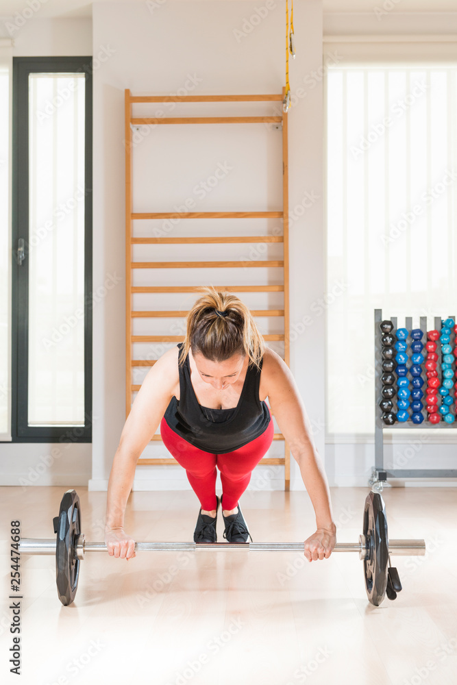 Fototapeta premium Woman practicing fitness