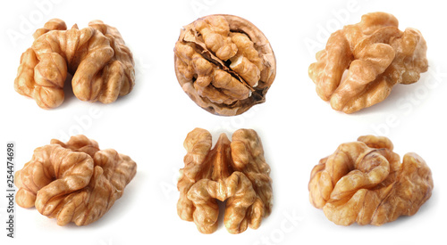 Set of different delicious organic nuts on white background