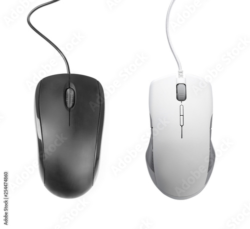 Set of different modern computer mice on white background, top view
