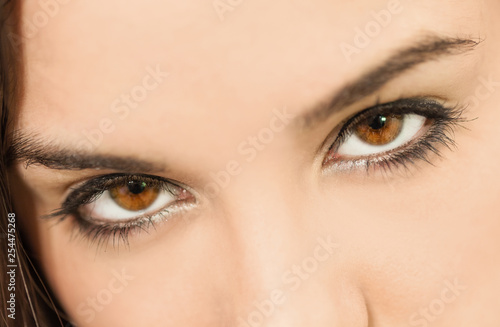 Female eyes looking at camera, beautiful young girl, close up