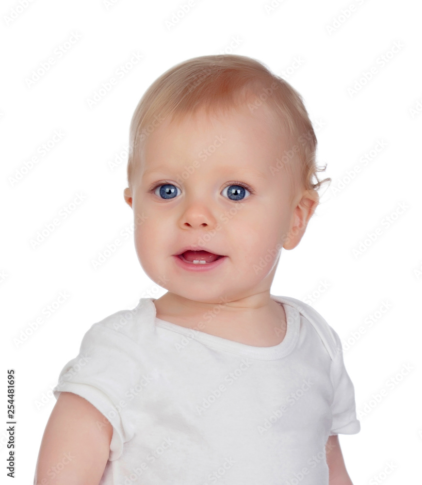 Small baby with a blue eyes and blond hair looking at camera
