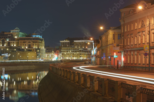 City streets in spring night. Brightly illuminated Moscow. Long exposure image. 