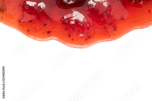 Strawberry jam on white background photo