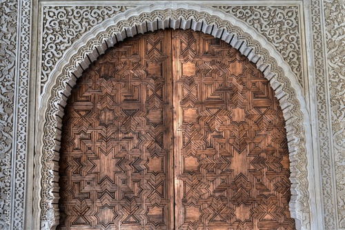Old wooden door in Nasrid Palaces, Alhambra complex, Granada, Andalusia, Spain