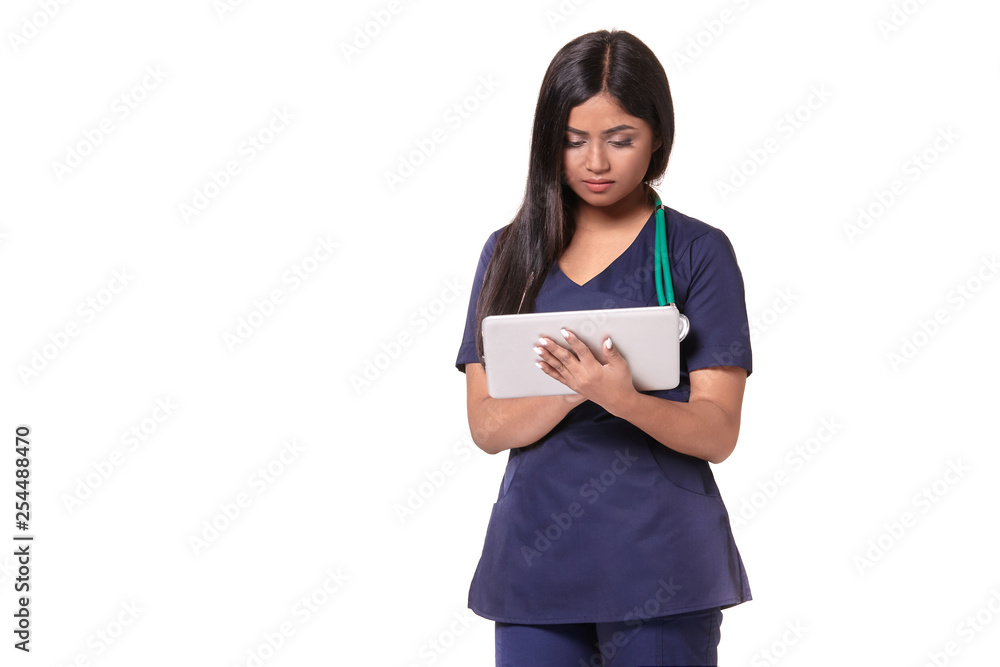 Young pretty doctor with a stethoscope and a medical history in her arms Young pretty doctor with a stethoscope and a medical history in her arms