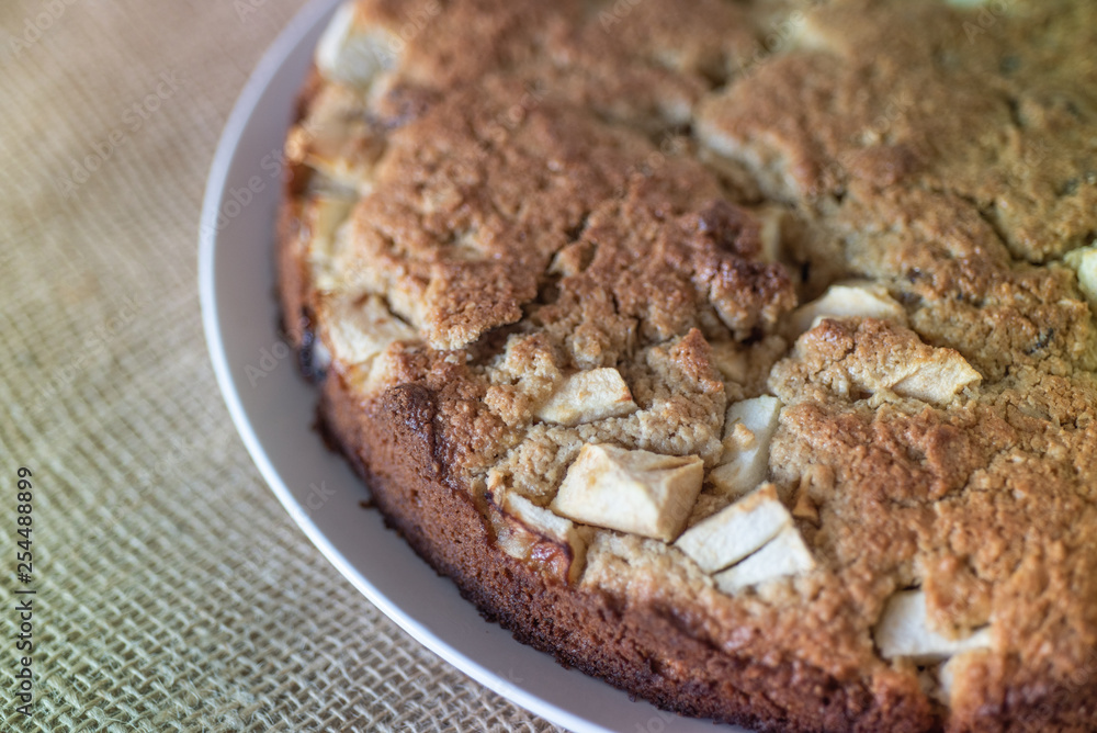 Homemade Healthy Vegan Oat apple pie pastry on burlap surface. Very Healthy Dessert concept.