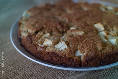 Homemade Healthy Vegan Oat apple pie pastry on burlap surface. Very Healthy Dessert concept.