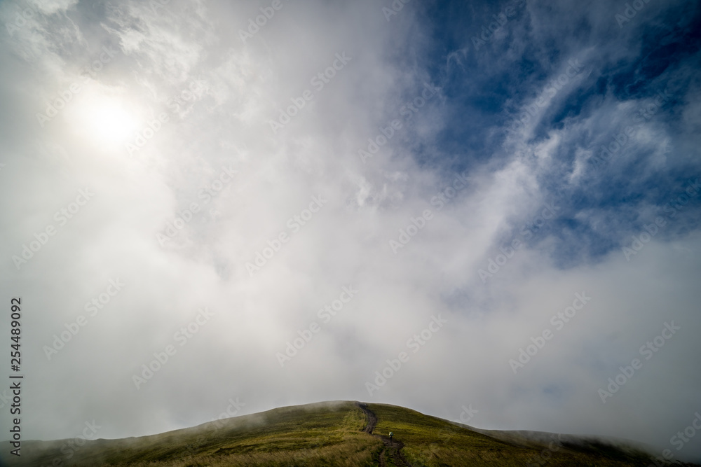 Landscape of Borzhava ridge of the Ukrainian Carpathian Mountains. Clouds above Carpathians